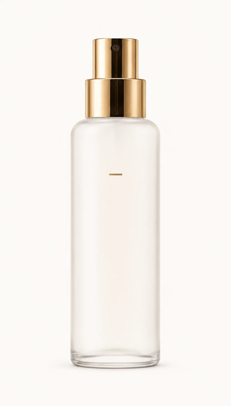 Minimalist clear glass bottle with a sleek gold spray cap, set against a plain light background.