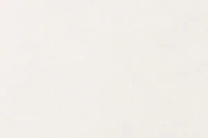 Close-up view of a plain white textured surface with subtle variations.